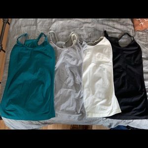 Lot of 4 nursing tanks EUC size medium